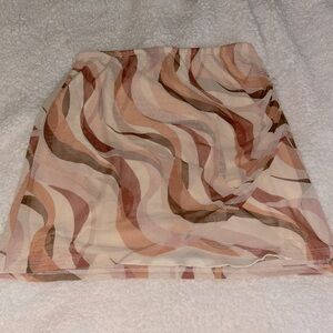 Like new, cute layered mini skirt in pretty neutral colors
